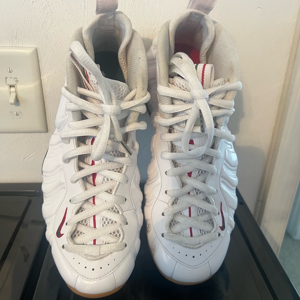 Nike Foamposite Sneakers in White with Red Details